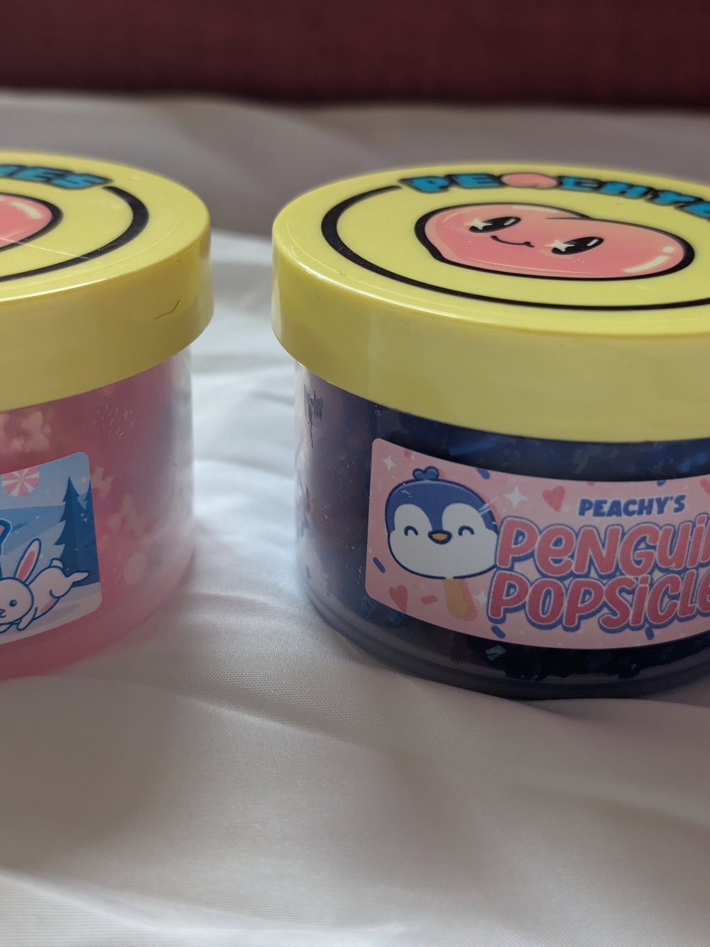Peachy's Penguin Popsicle Kids Toy Slime - Yellow Lid, Blue Slime